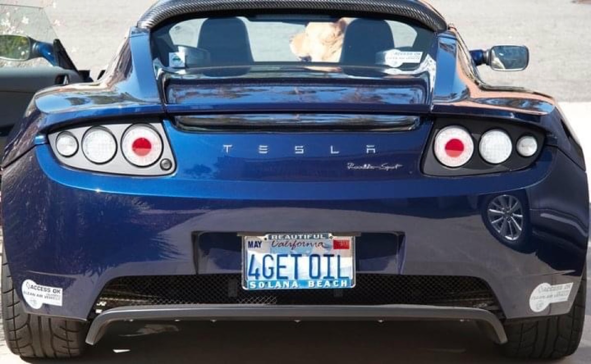 Jason Knapp's Tesla Roadster with a 4GETOIL license plate